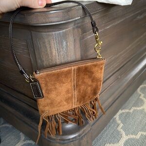 Coach brown suede wristlet